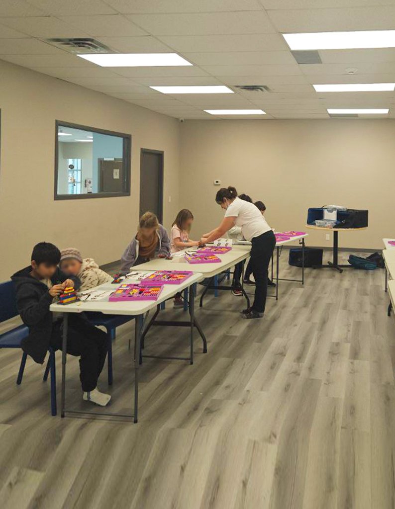 Children learning real engineering and STEM concepts through hands-on building activities at InnokidsYYC in Calgary.