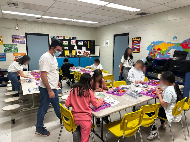 STEM educator teaching kids in after school program Calgary